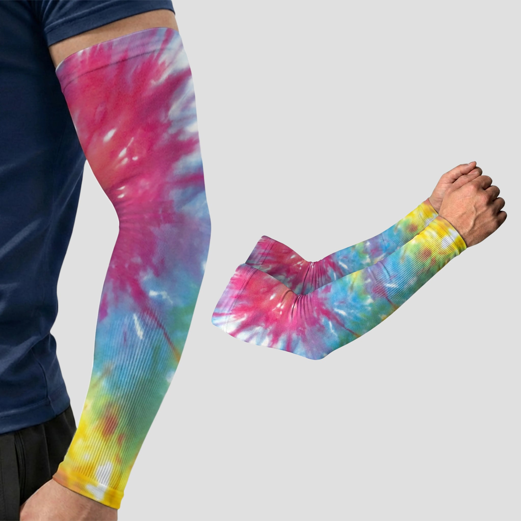 Wearing ARMORAY’s Armoray® Patterned Arm Sleeves — available in 35+ bold designs — this person enjoys both stylish flair and UPF 50+ sun protection, with a separate close-up of the same designer sleeve displayed on a plain gray background.