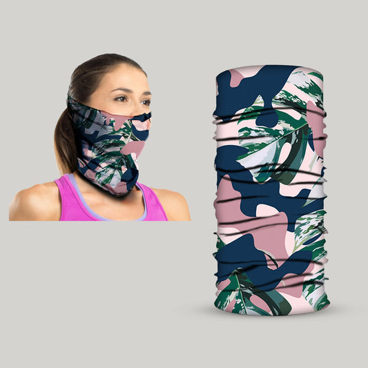 Wearing the Armoray® Bandanas by ARMORAY in a vibrant pattern of pink, navy, and green, a woman demonstrates its versatility as both a neck gaiter and rugged bandana; beside her, the same multifunctional piece is shown unfolded against a plain background.