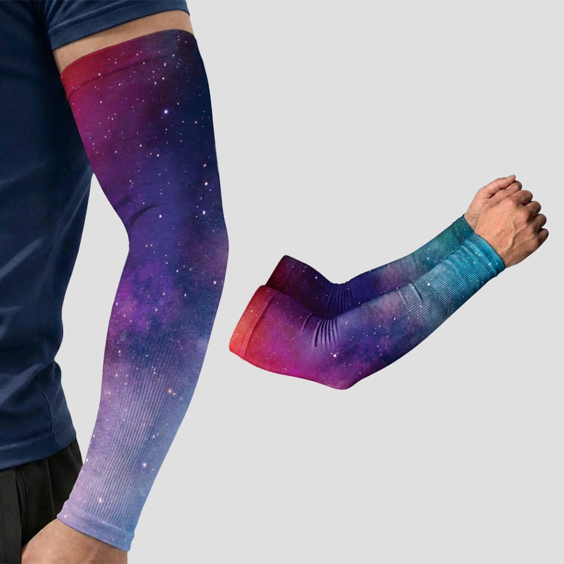 Wearing the ARMORAY Armoray® Patterned Arm Sleeve in a vibrant galaxy print—which delivers UPF 50+ sun protection—a person showcases this designer accessory, while a second sleeve from the same 35+ bold looks collection is displayed separately on a plain background.