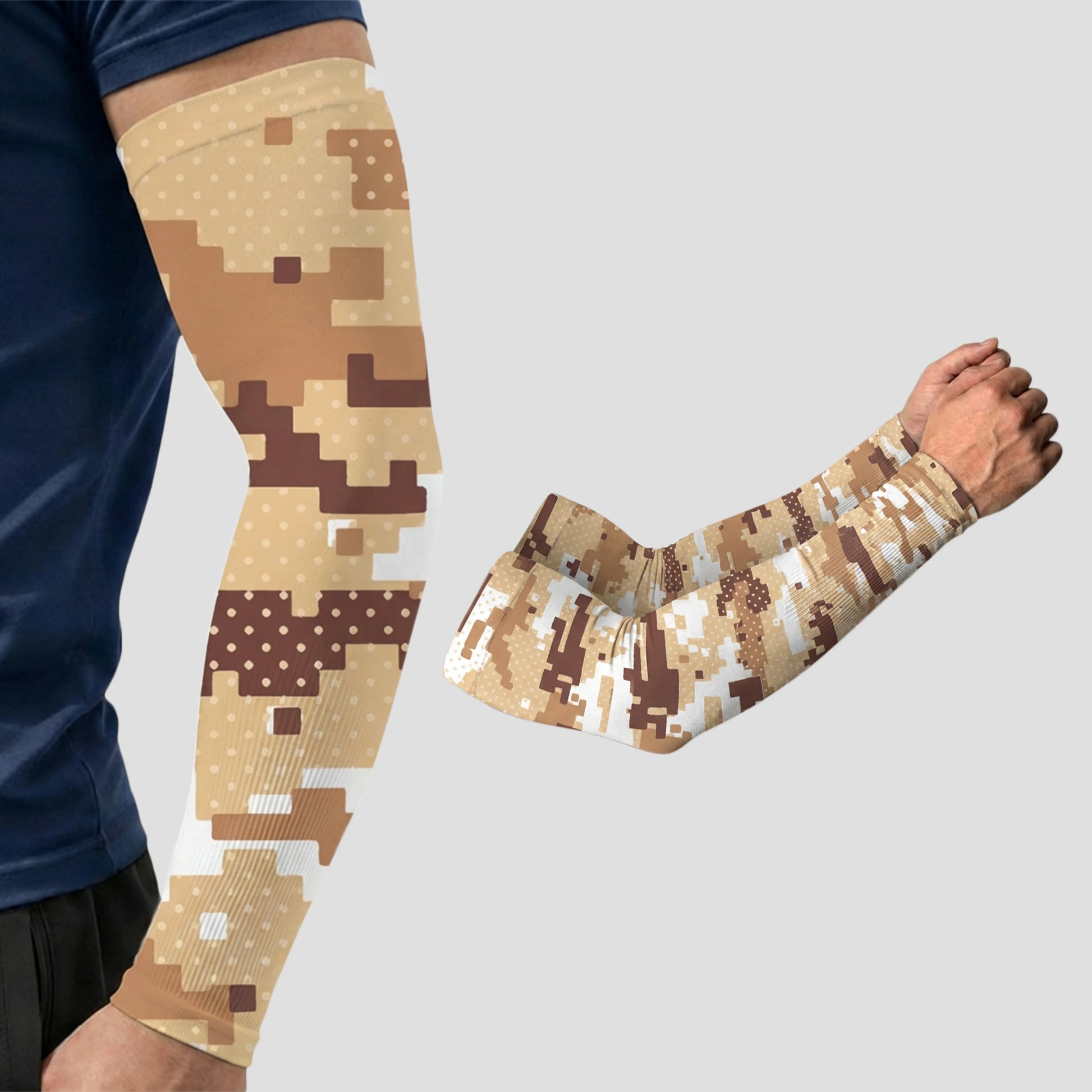 A person models an ARMORAY Armoray® Patterned Arm Sleeve in tan and brown digital camouflage, featuring UPF 50+ sun protection, with a second identical sleeve displayed separately on a grey background.