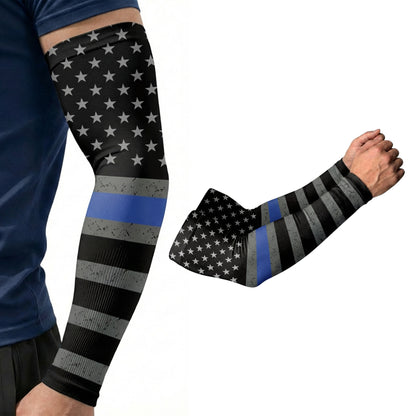 A person wears an Armoray® Designer Arm Sleeve by ARMORAY Basics in black with a white star pattern, grey stripes, and a blue stripe; UPF 50+ sun protection. Another image displays the sleeve alone.