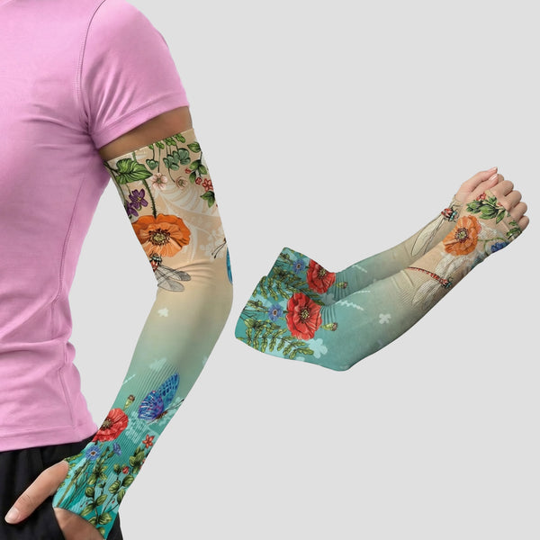 A person wears an ARMORAY Armoray® Garden Collection Arm Sleeve — Designed to Delight Outdoors on one arm, with the matching sleeve shown separately against a neutral background. These stylish ARMORAY sleeves offer UPF 50+ sun protection, making them ideal for sunny outdoor adventures.