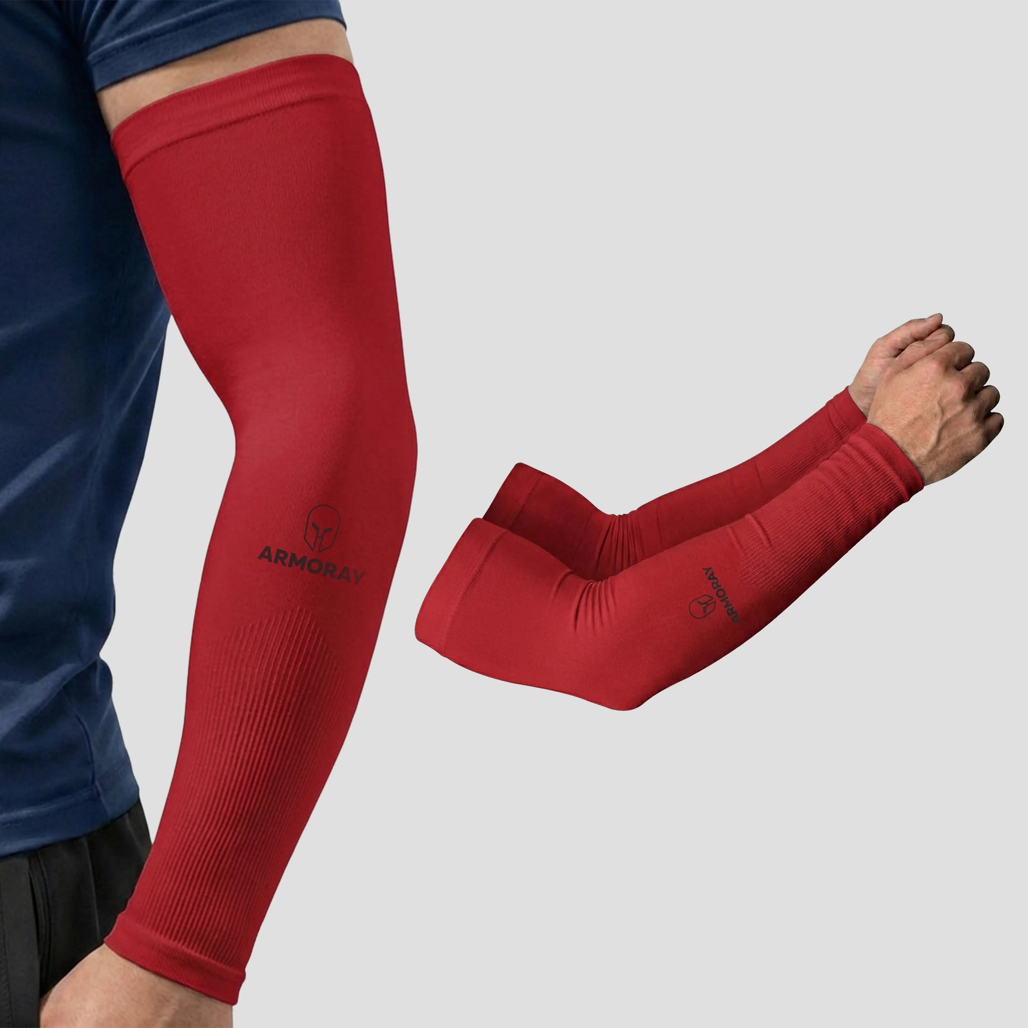 A person wears a comfortable red Armoray® Classic Arm Sleeve by ARMORAY on their left arm; a second, isolated image displays both red sleeves with the ARMORAY logo visible, designed to help you stay cool and protected.