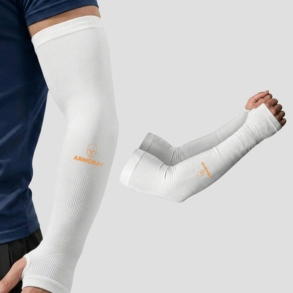 A person wears Armoray® Thumbhole Arm Sleeves by ARMORAY, featuring a white compression design with extended hand coverage and convenient thumbholes for added comfort. An extra pair of these sun protection sleeves is displayed beside the wearer on a plain background.