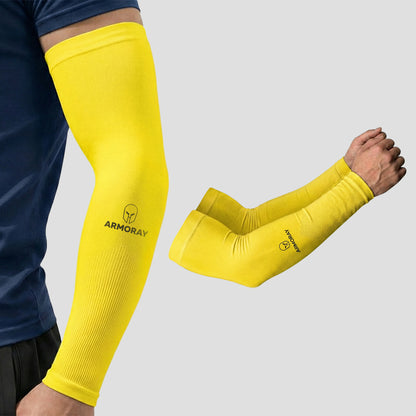 A person is shown wearing an Armoray® Classic Arm Sleeve in yellow on one arm, with a matching pair displayed beside them. These ARMORAY-branded sleeves are designed to keep you cool, comfortable, and protected.