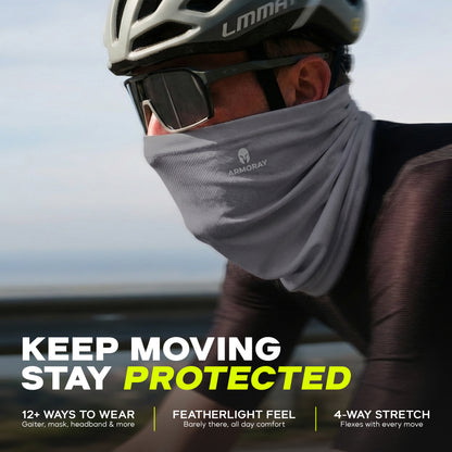 A cyclist sports an ARMORAY Basics PERFORMANCE TEK BANDANA and helmet. The bandana offers protection, versatility, lightweight comfort, and 4-way stretch—ideal for active lifestyles.