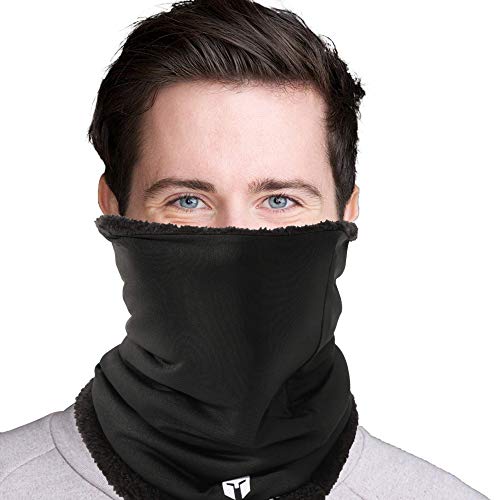 A person wearing the ARMORAY Basics ARMORAY FLEECE WINTER NECK WARMER, which covers the lower face and keeps only the eyes and forehead visible—an ideal cold weather accessory for winter sports.