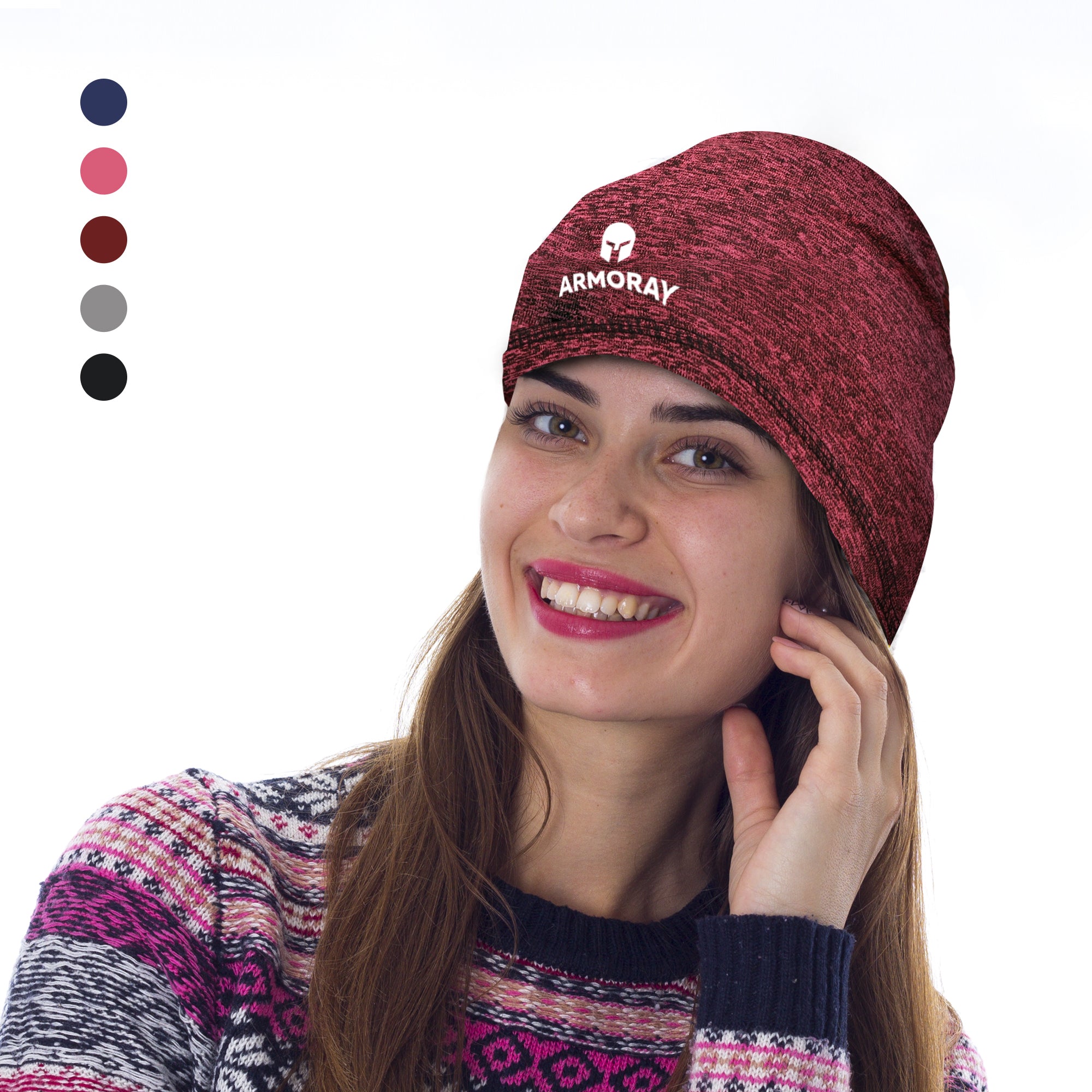 A woman wearing an Armoray® Performance Skull Cap by ARMORAY Basics, perfect as a cold-weather helmet liner, and a patterned sweater smiles at the camera; five swatches are displayed on the left.